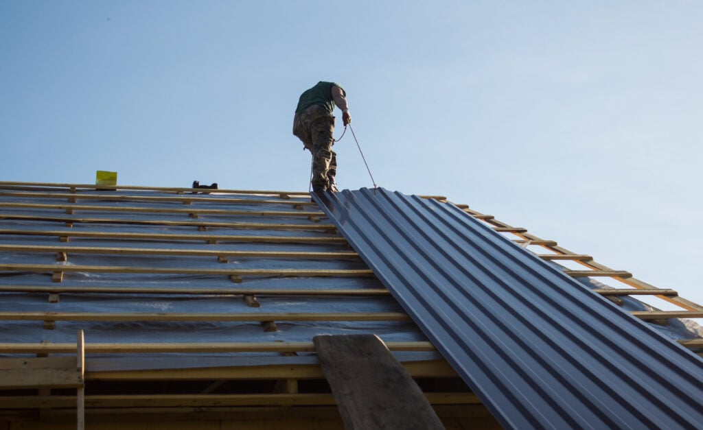 Construction work on the roof of an apartment house in the open air