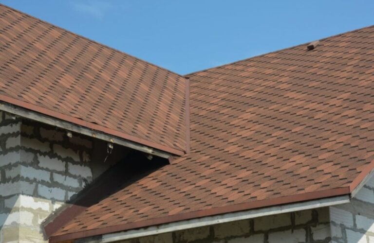 asphalt-shingles-with-roof-flashing brick walls