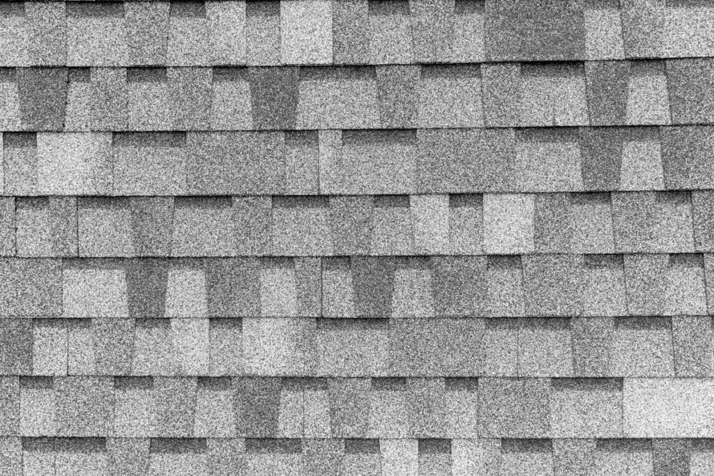close-up of light grey asphalt shingles