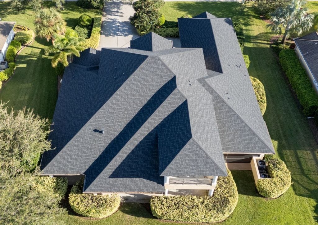 grey shingles roof big house Chapman Owens Corning Onyx Black-09