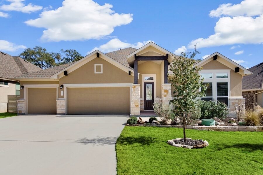 a house with a green lawn