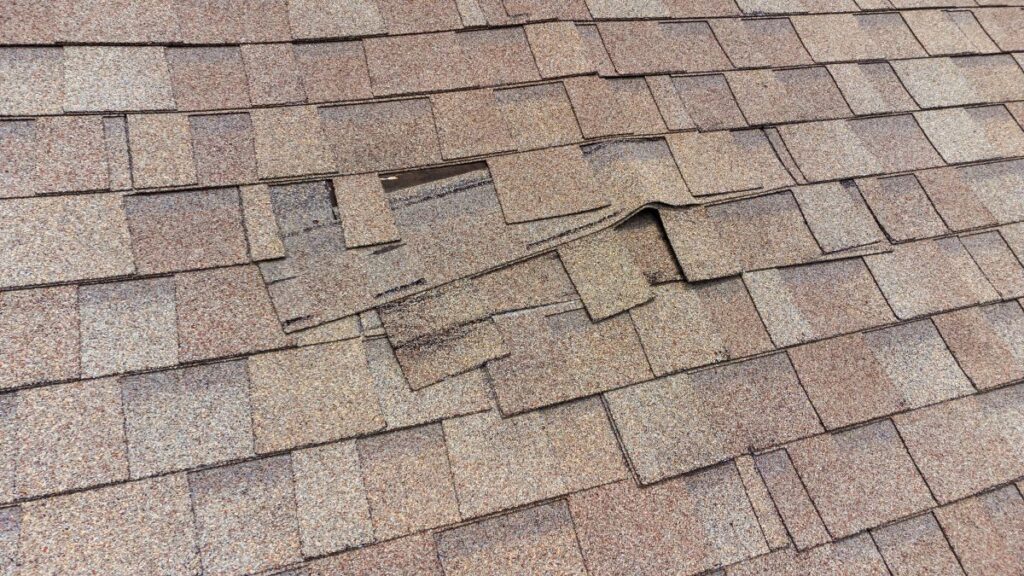 roof leak repair cost brown shingles roof damaged by water leak