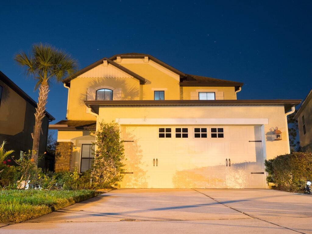 tall-home-with-sun-on-home-roof