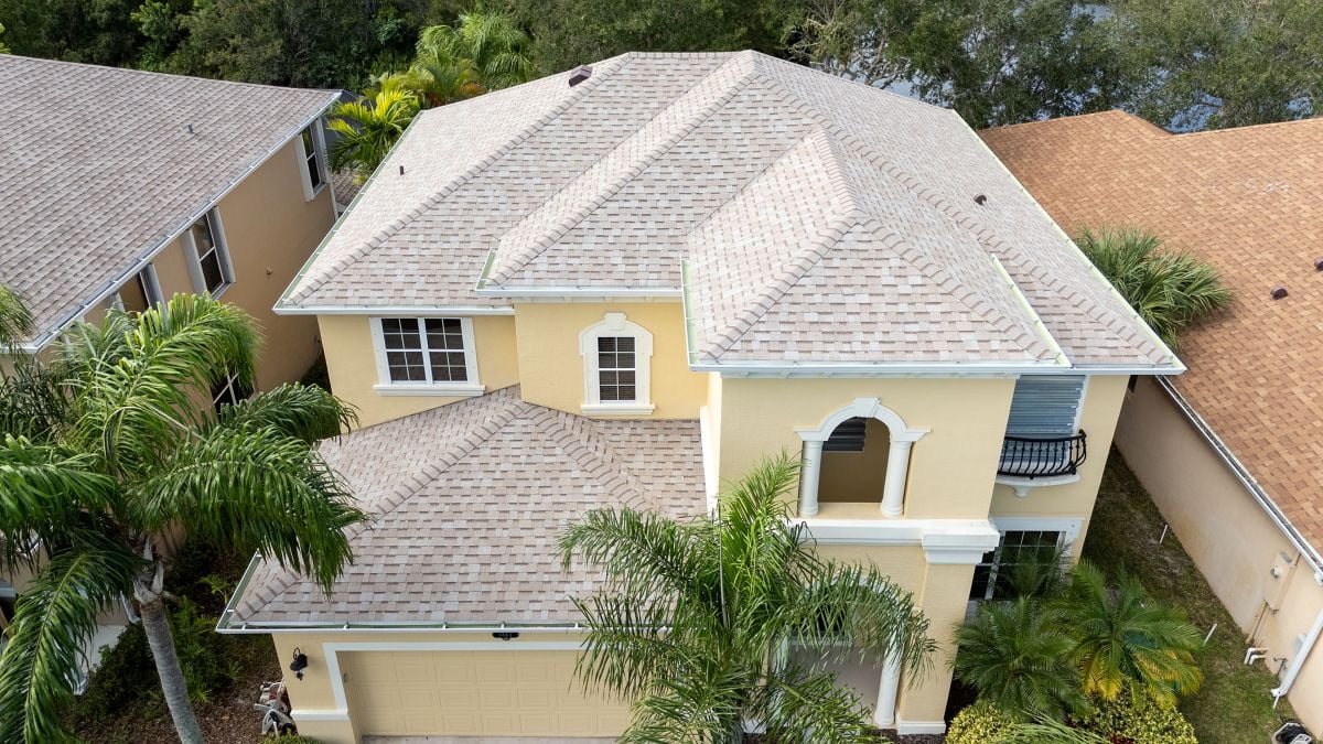 are tamko shingles good big white and yellow house