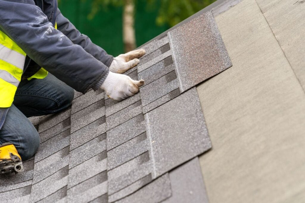 are tamko shingles good worker using gloves installing new roof
