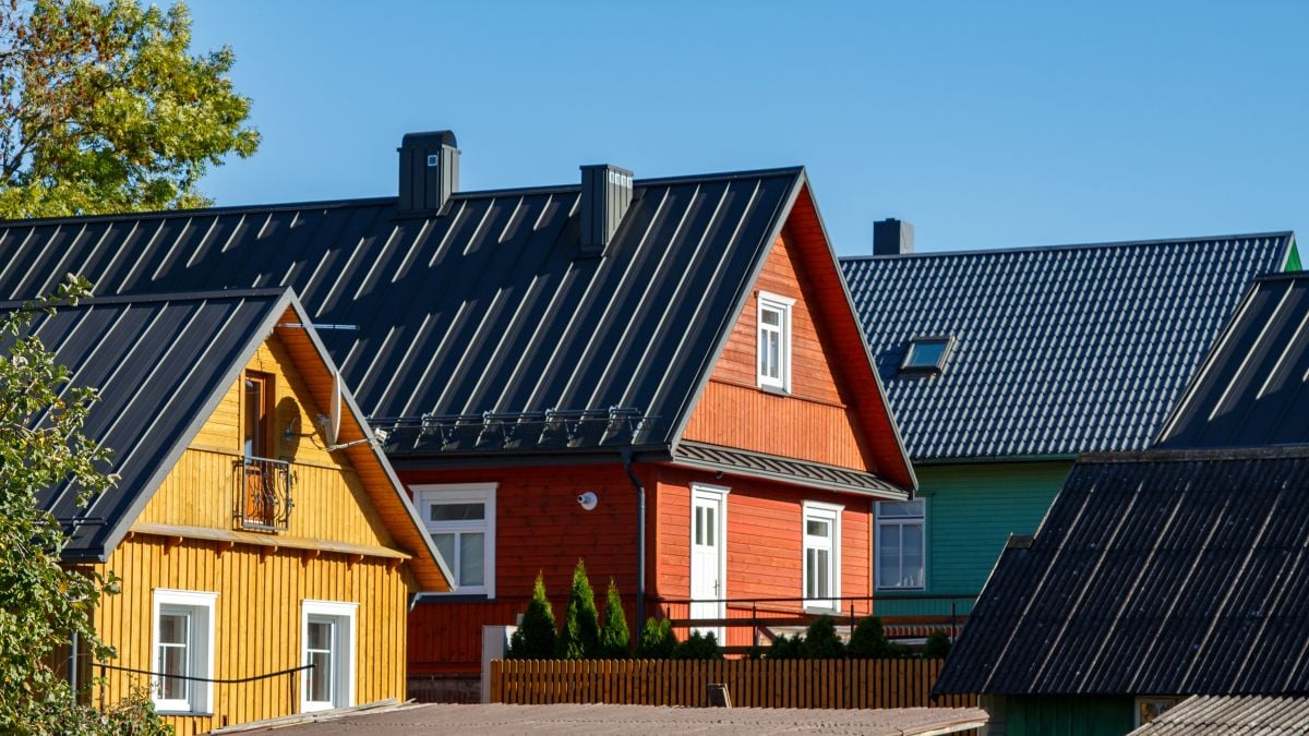 metal roof and siding color combinations yellow, orange and green houses