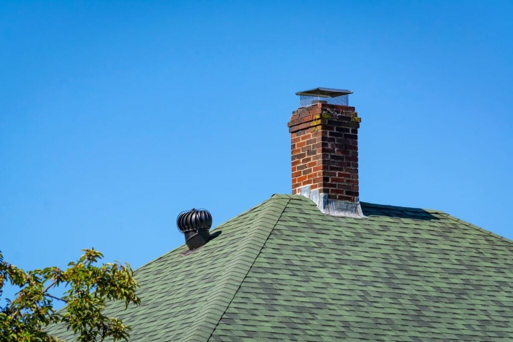 owens corning shingles colors green roof brick wall chimney
