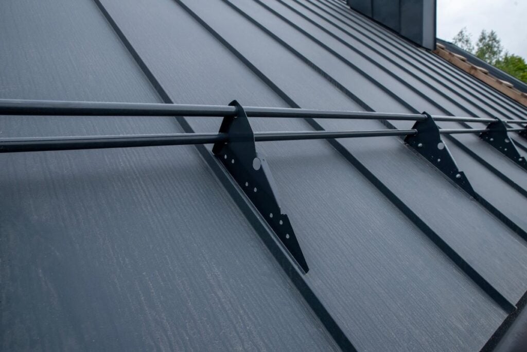 cost of metal roof vs shingle snow guard close up