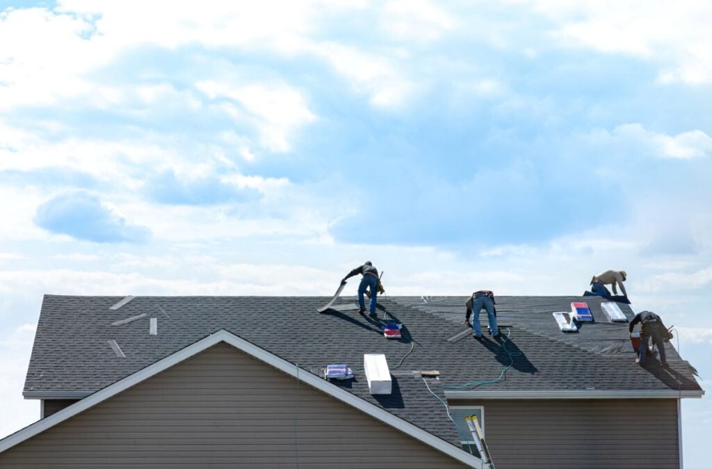 gaf vs certainteed workers repairing shingles roof